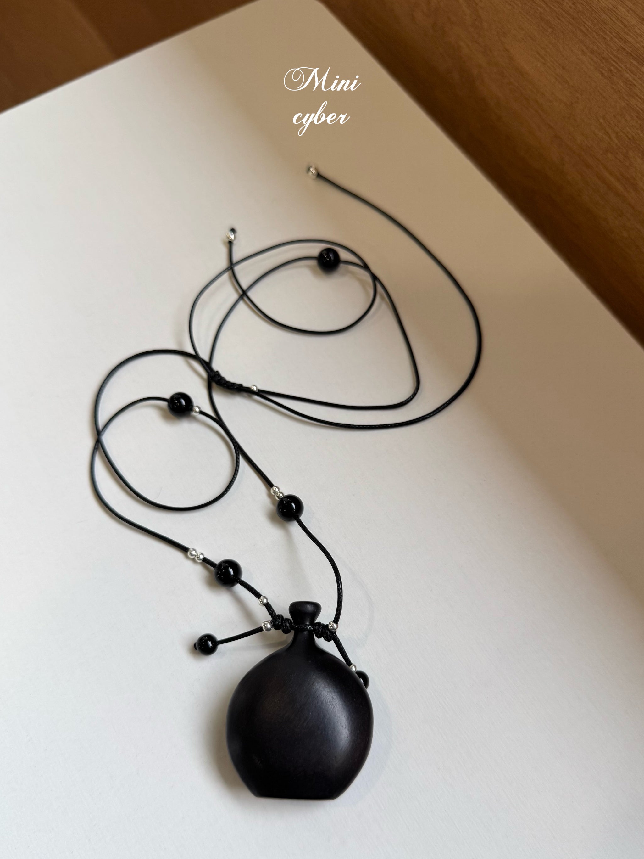 Ebony Flask Pendant Necklace