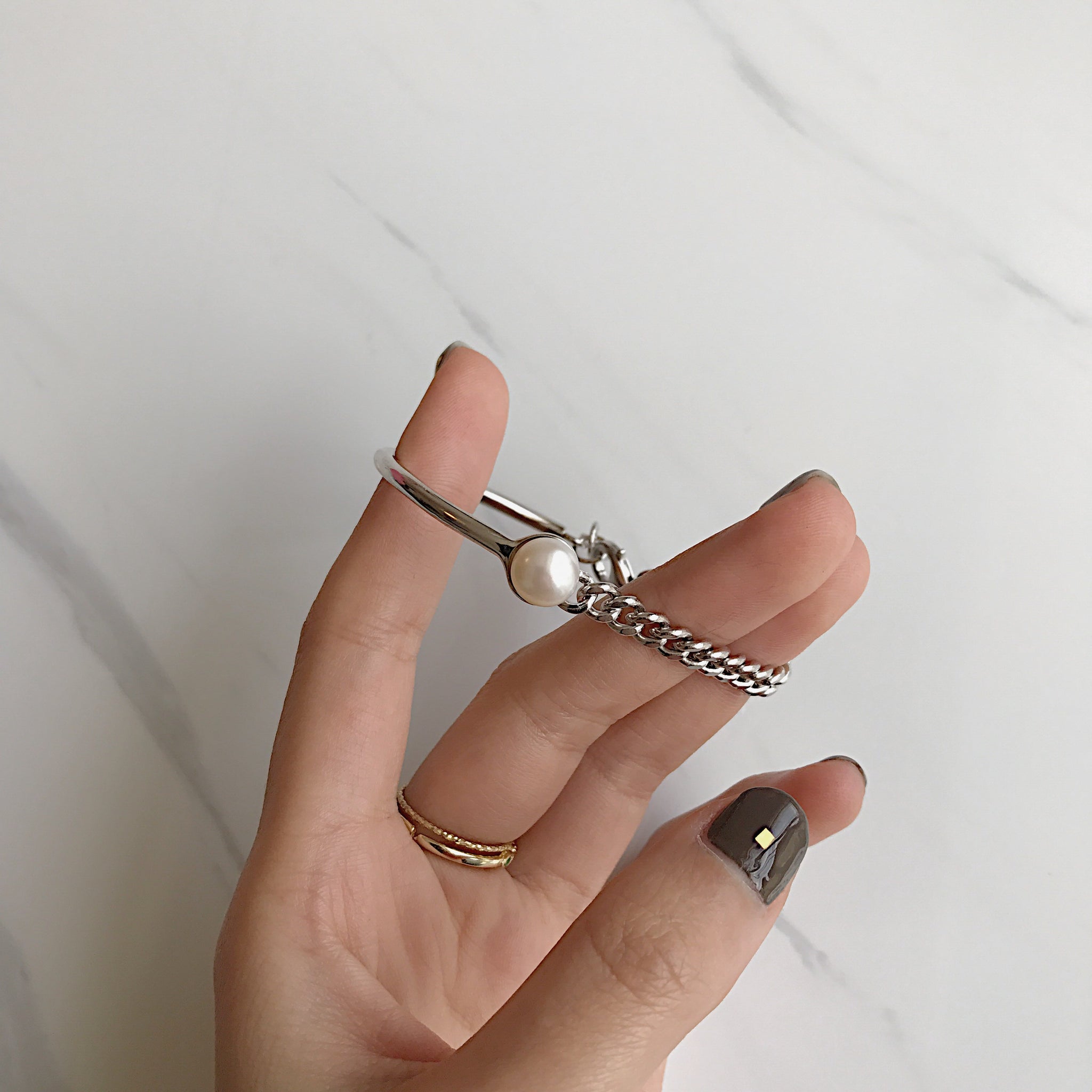 Two Sides of a Pearl Chain