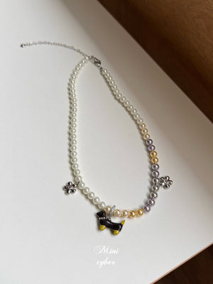 Wiggly Tail Pearl Pup Necklace