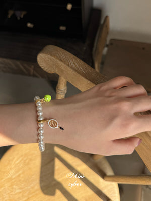 Elegant Ace Pearl Bracelet
