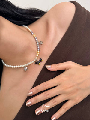 Wiggly Tail Pearl Pup Necklace