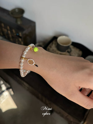Elegant Ace Pearl Bracelet