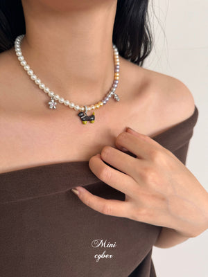 Wiggly Tail Pearl Pup Necklace