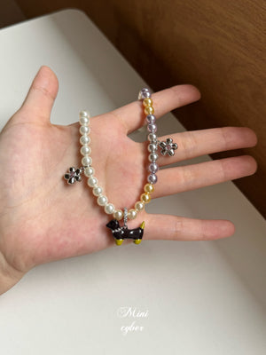 Wiggly Tail Pearl Pup Necklace