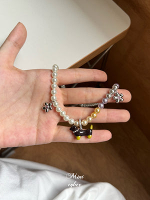 Wiggly Tail Pearl Pup Necklace